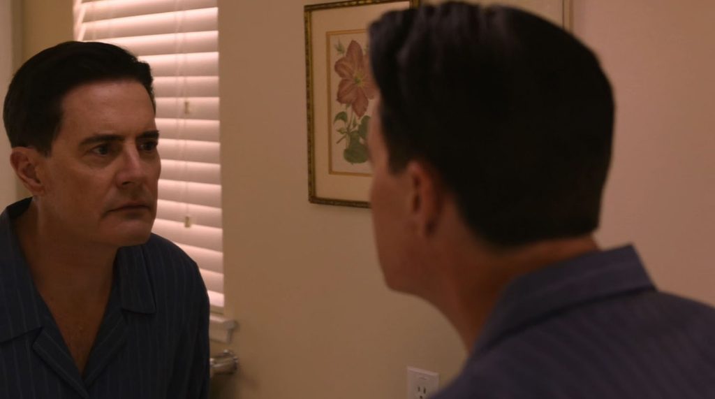Dougie Jones looking at himself in the mirror