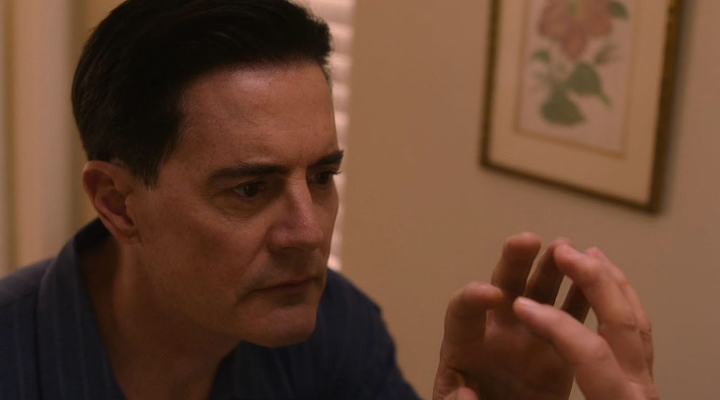 Dougie Jones looking at himself in the mirror