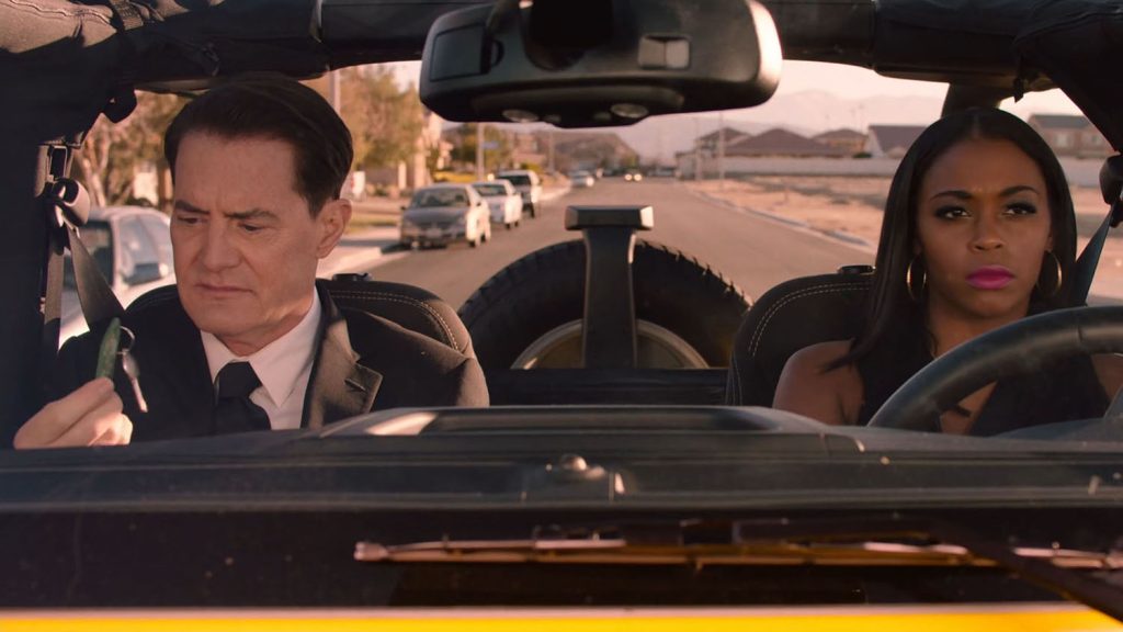 Dougie Jones and Jade riding in her jeep
