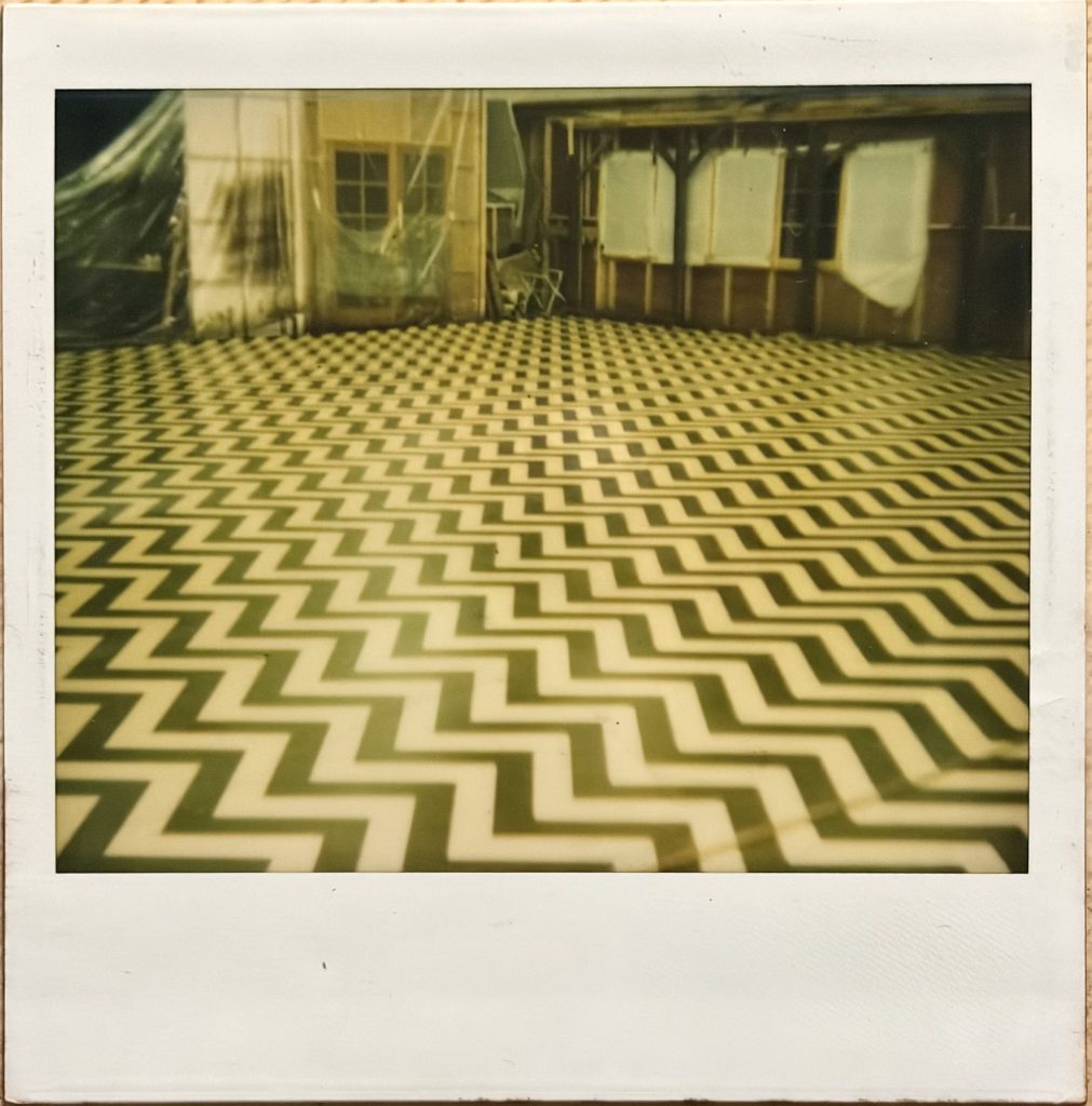 Polaroid photo of Black Lodge chevron floor
