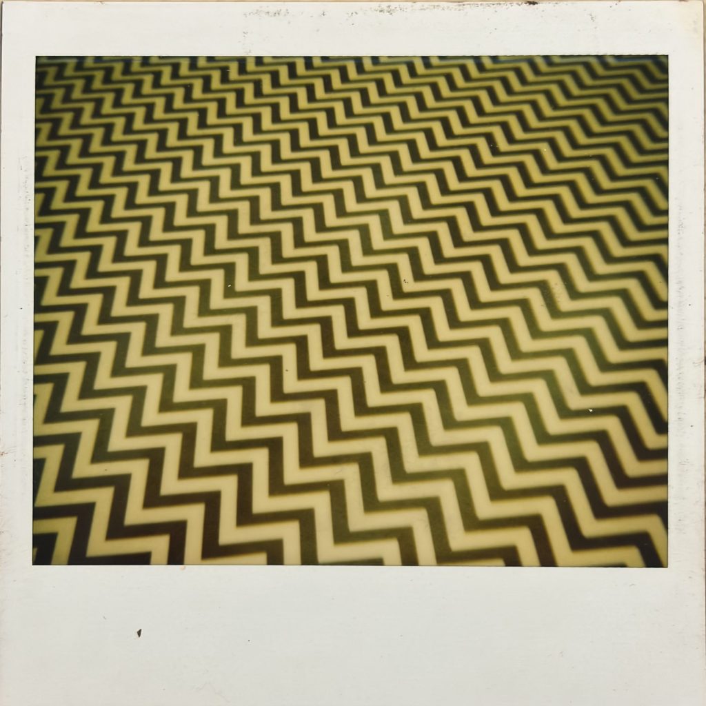Polaroid photo of Black Lodge chevron floor