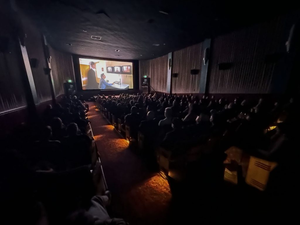 North Bend Theatre with people watching a movie