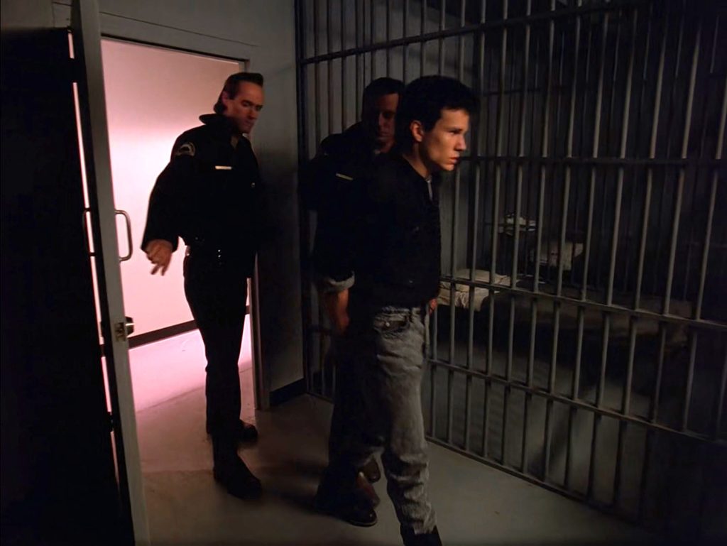 Deputy Brennan and Deputy Hawk escort James Hurley into the holding area