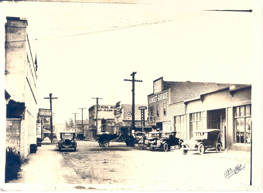 Sunset Garage building before remodel, North Bend Way looking East, 1921.