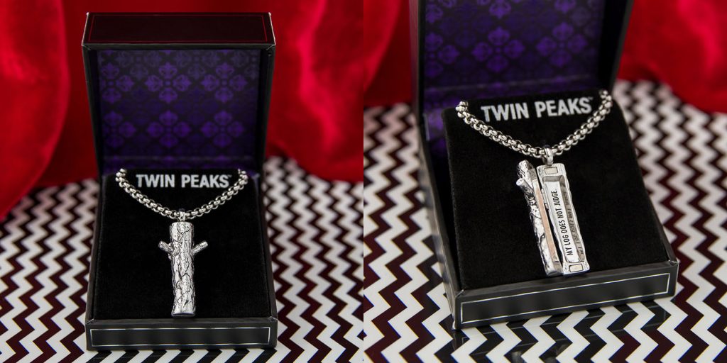 Silver log as the Log Lady Locket in a display box