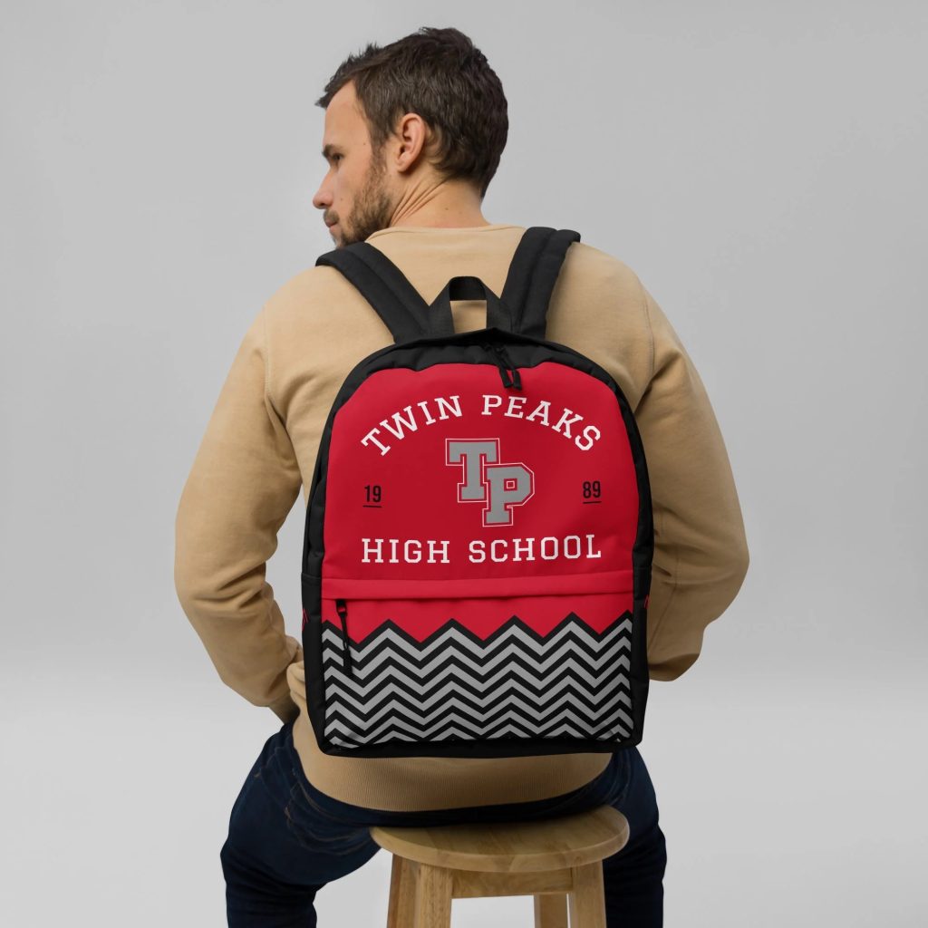 Male model wearing Twin Peaks High School Backpack