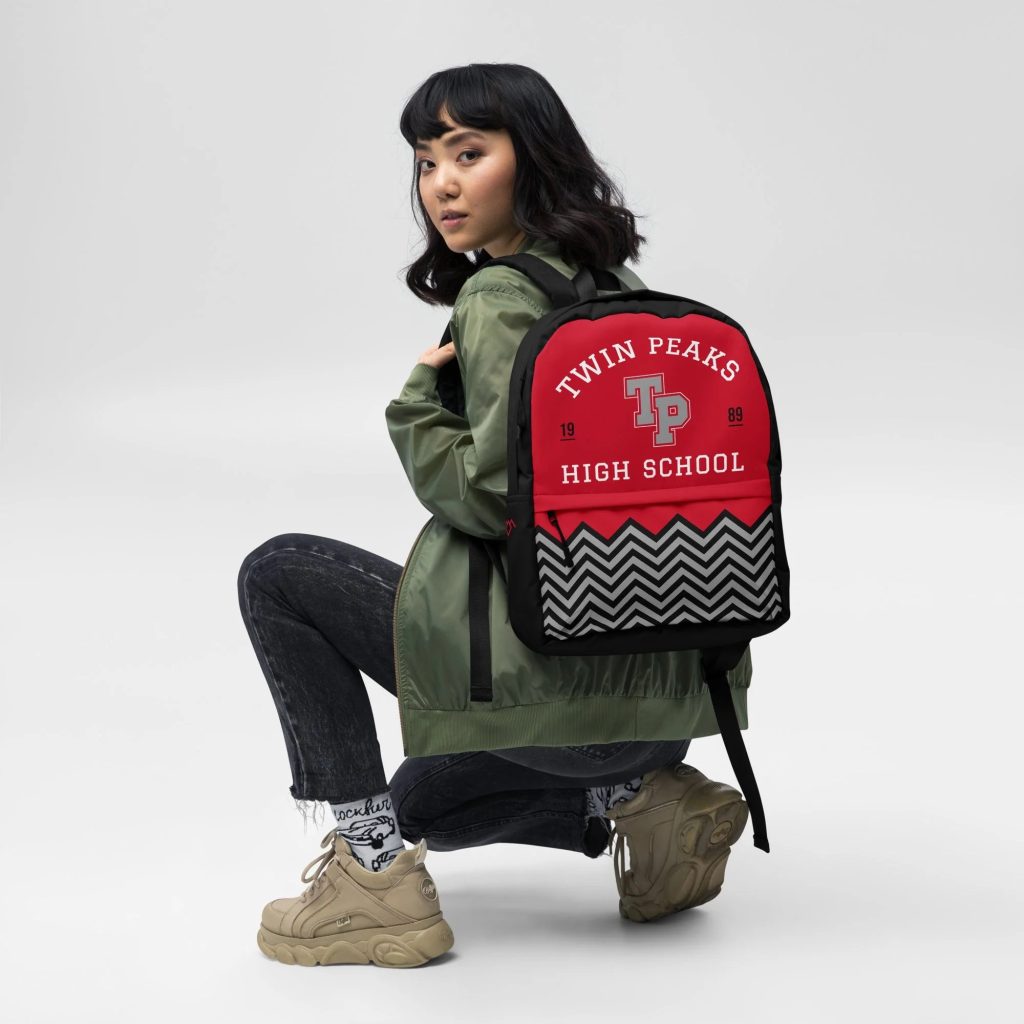 Female model wearing Twin Peaks High School Backpack