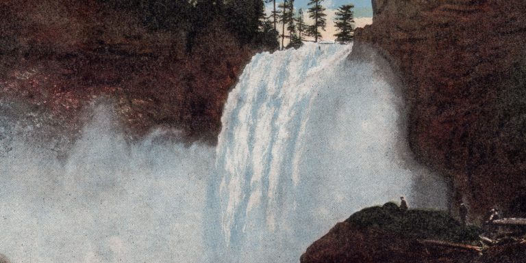 Front of a postcard featuring Snoqualmie Falls