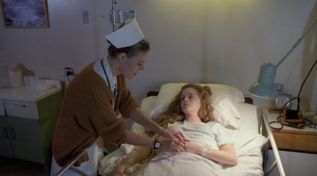 B. Roundtree in Annie Blackburn's hospital room