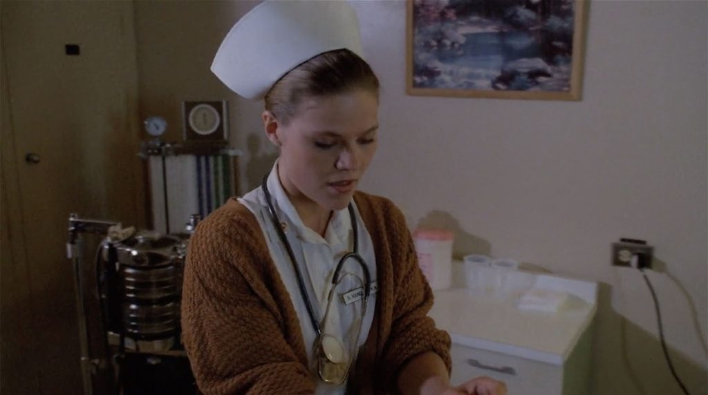 B. Roundtree in Annie Blackburn's hospital room