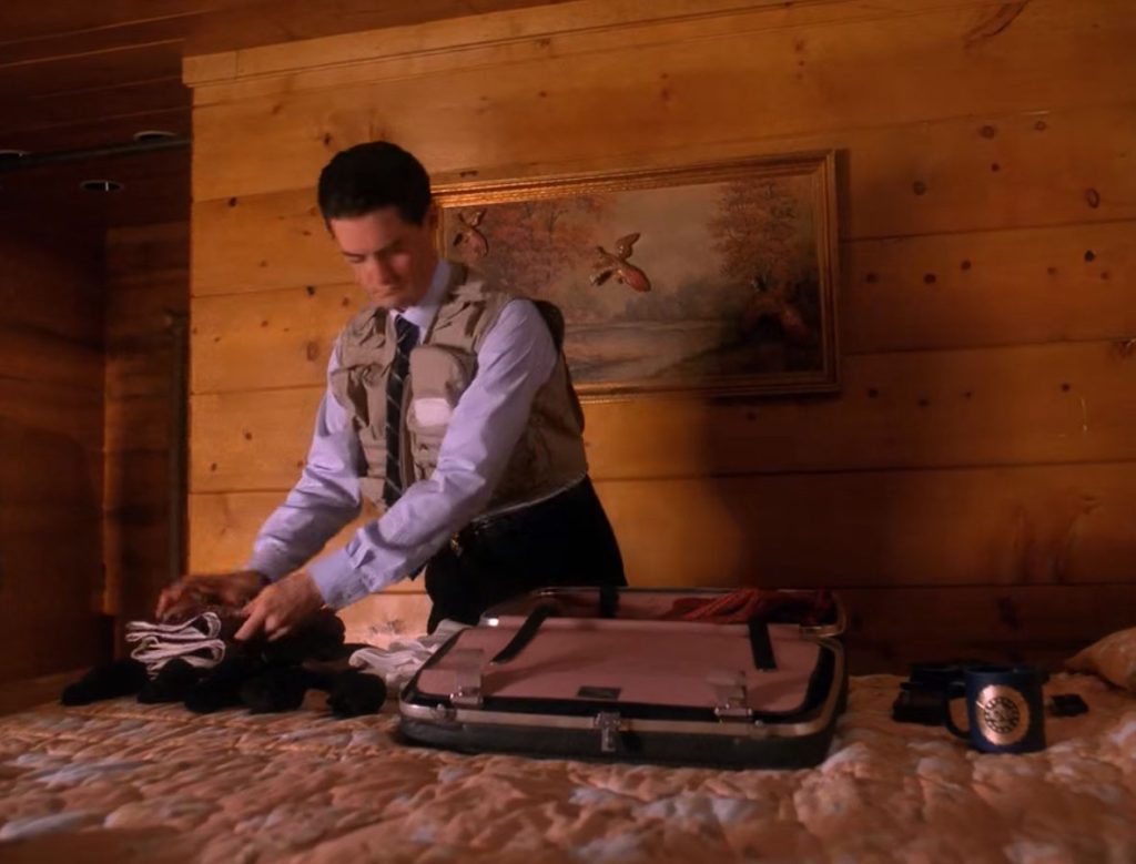 Cooper packing his suitcase