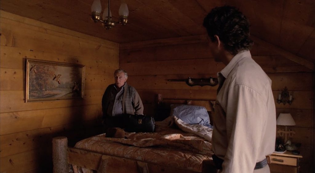 Doc Hayward and Sheriff Truman standing in Cooper's room