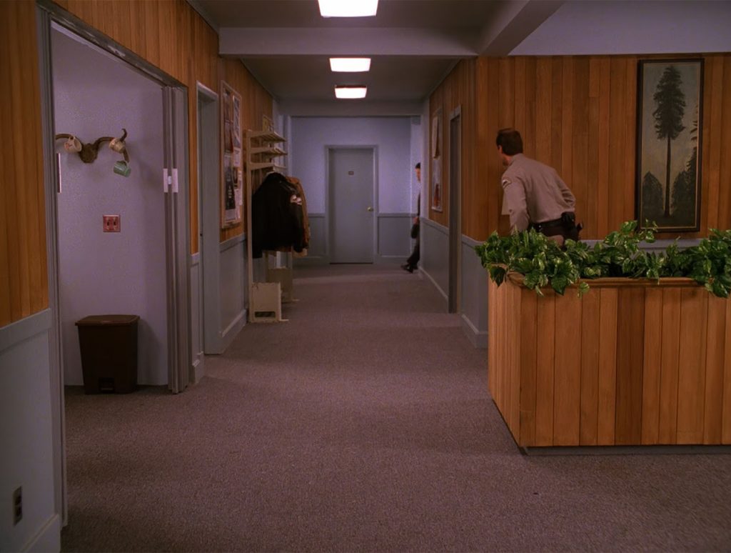 Deputy Andy Brennan hiding in the lobby