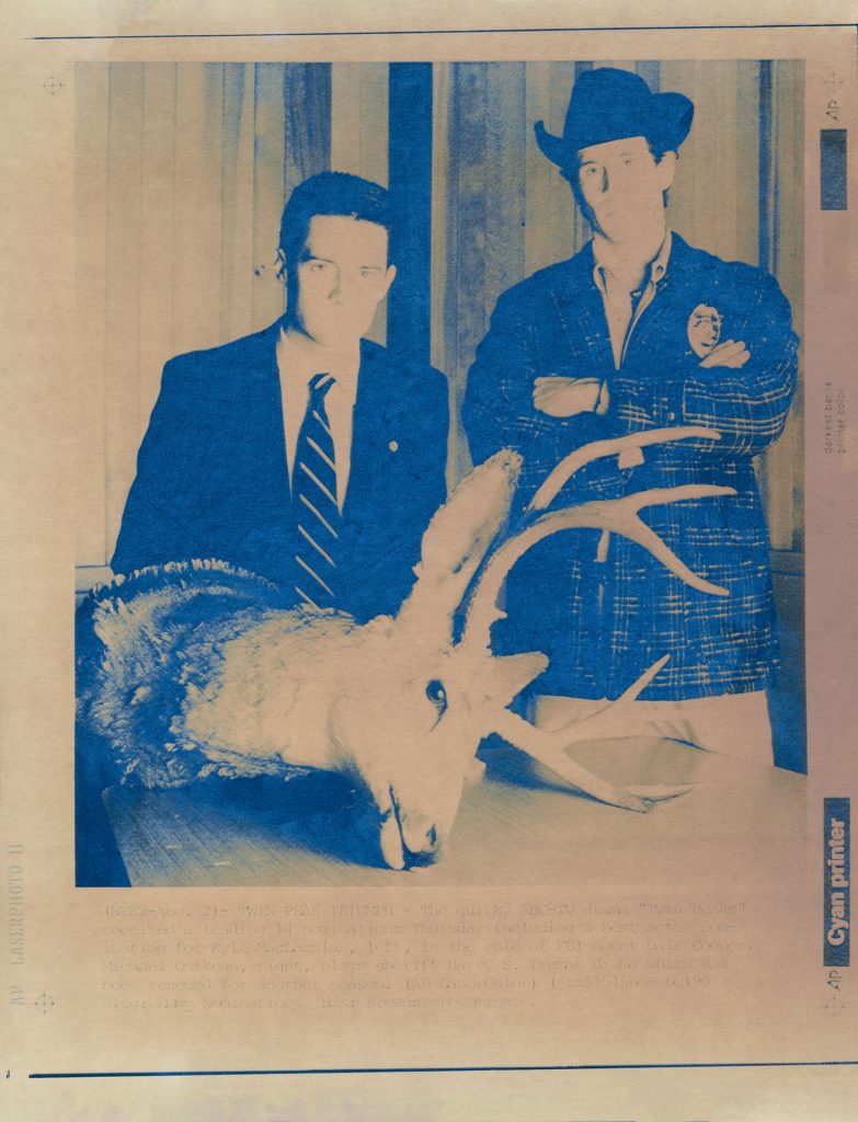 Cyan image of Special Agent Dale Cooper and Sheriff Harry S. Truman from an AP Laserphoto
