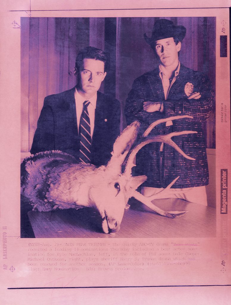 Magenta image of Special Agent Dale Cooper and Sheriff Harry S. Truman from an AP Laserphoto