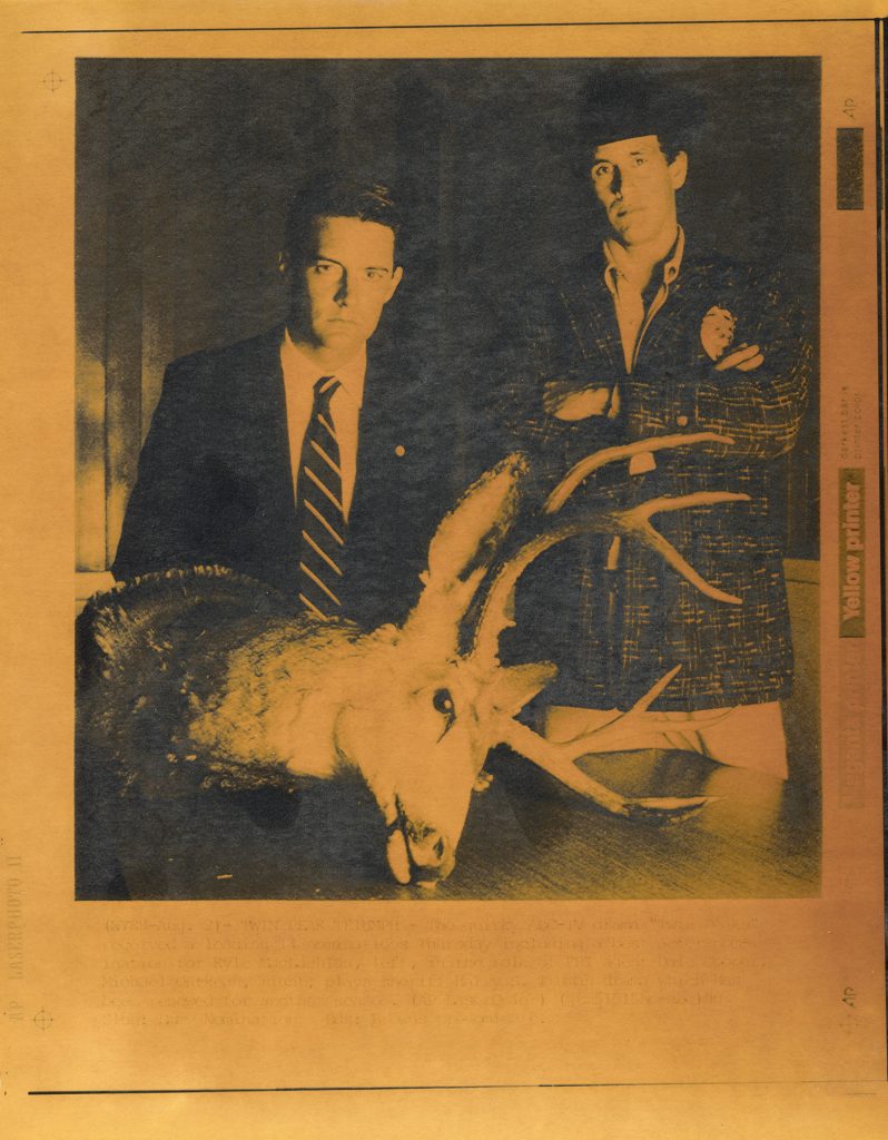 Yellow image of Special Agent Dale Cooper and Sheriff Harry S. Truman from an AP Laserphoto