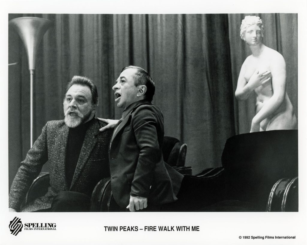 Publicity photo of Gerard and the Man From Another Place speaking in unison