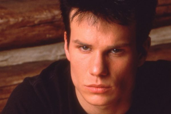 James Marshall as James Hurley sitting at a table with the other half of Laura Palmer's half-heart necklace