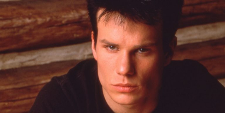 James Marshall as James Hurley sitting at a table with the other half of Laura Palmer's half-heart necklace