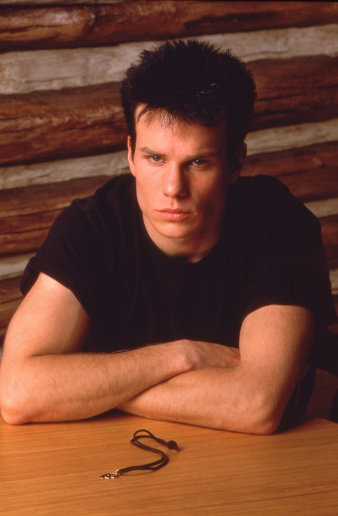 James Marshall as James Hurley sitting at a table with the other half of Laura Palmer's half-heart necklace