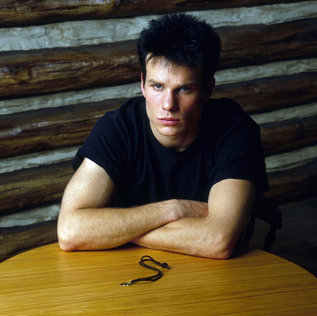 James Marshall as James Hurley sitting at a table with the other half of Laura Palmer's half-heart necklace