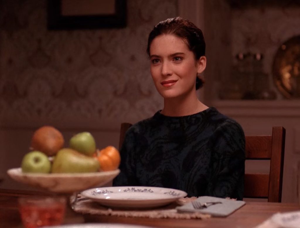 Donna Hayward sitting at the dining room table