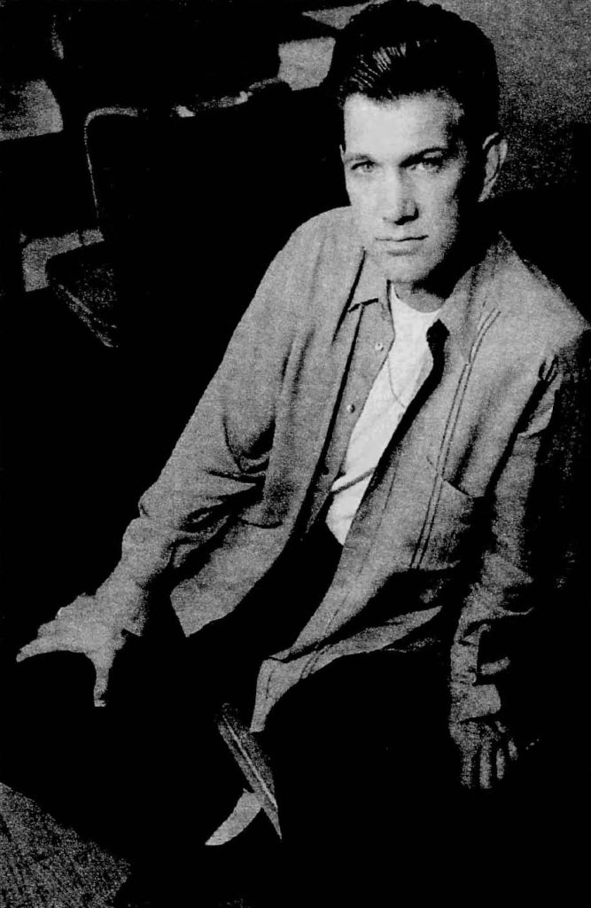 Black and white photo of Chris Isaak