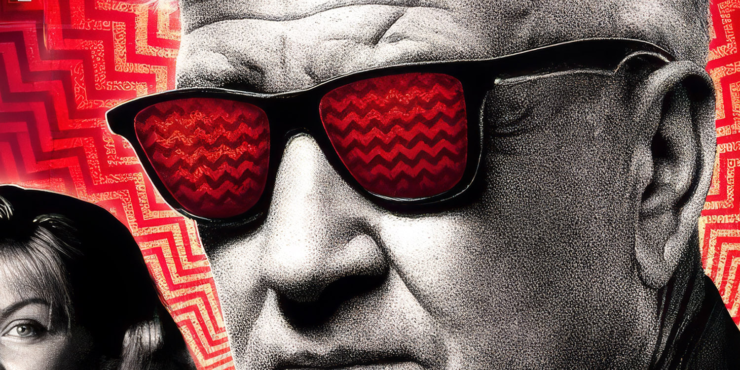 David Lynch wearing glassed with chevron pattern in reflection