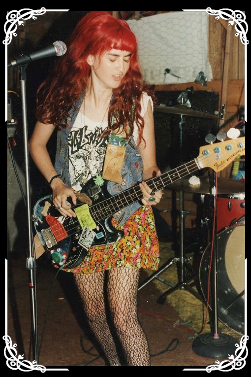 Jula Bell playing guitar