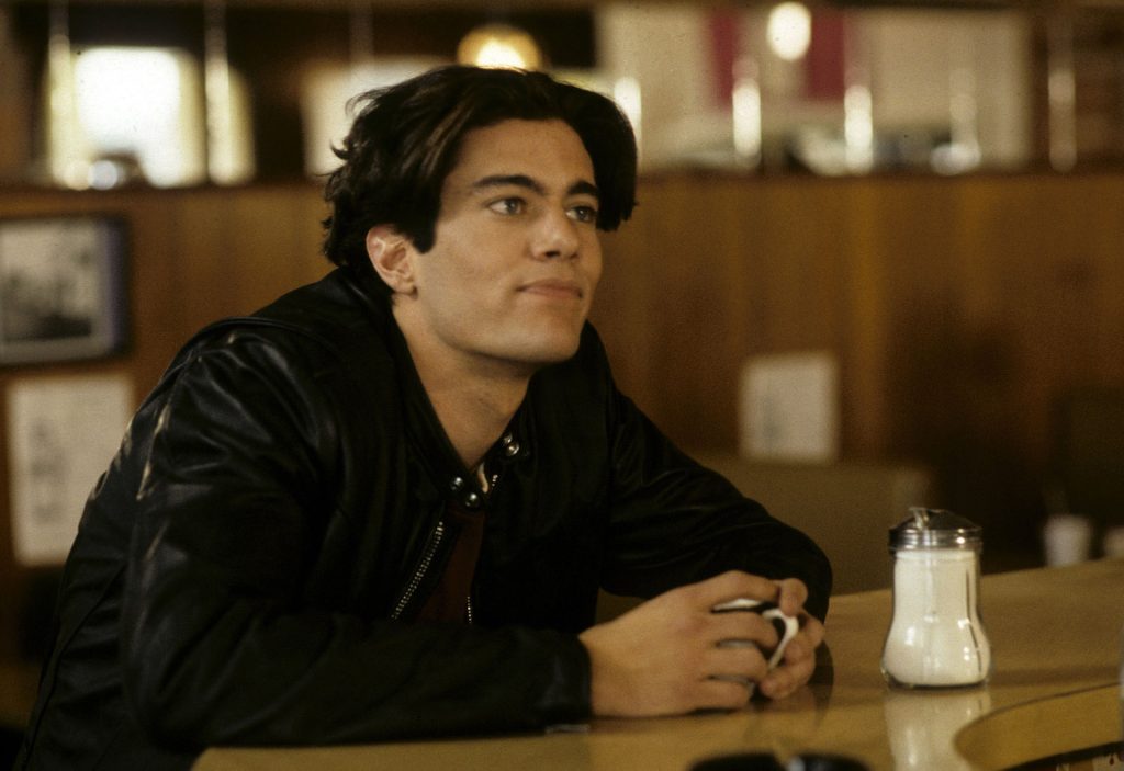 Bobby Briggs (Dana Ashbrook) sitting at the counter in the Double R Diner