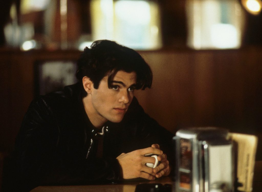 Bobby Briggs (Dana Ashbrook) sitting at the counter in the Double R Diner