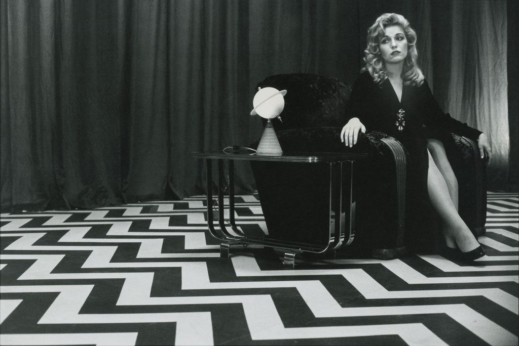 Laura Palmer sitting in the Red Room