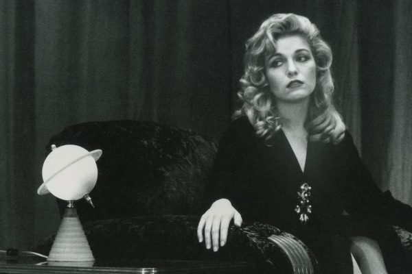 Laura Palmer sitting in the Red Room