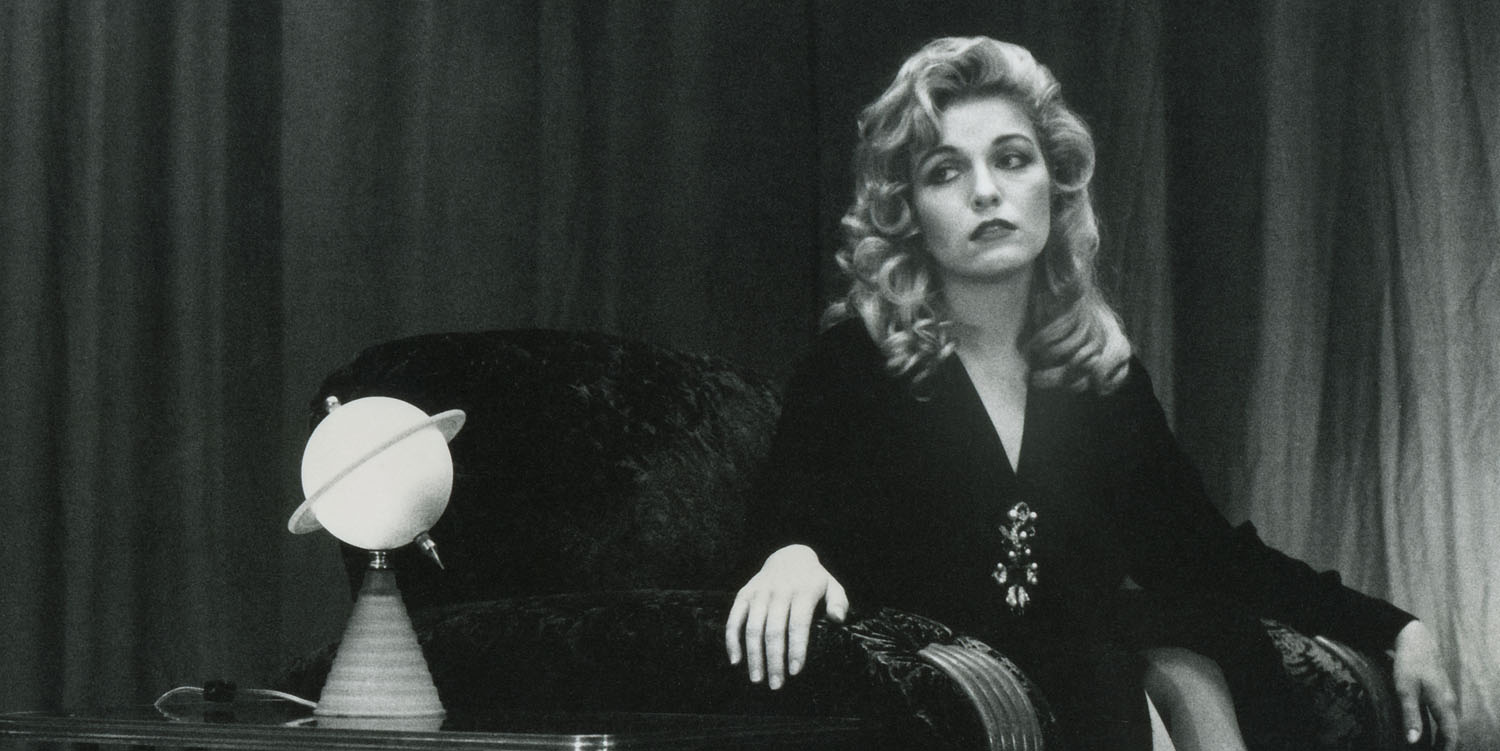 Laura Palmer sitting in the Red Room