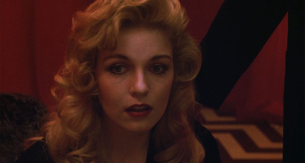 Laura Palmer sitting in the Red Room