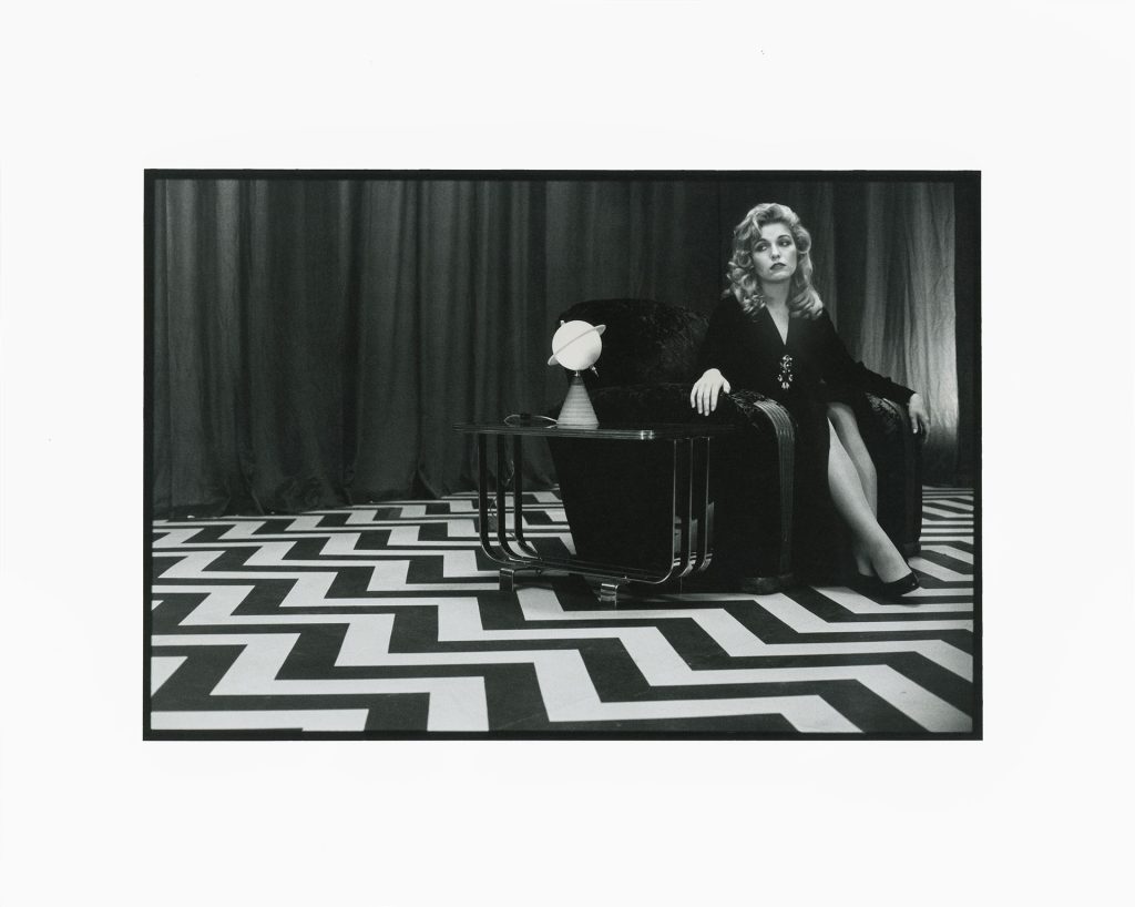 Laura Palmer sitting in the Red Room