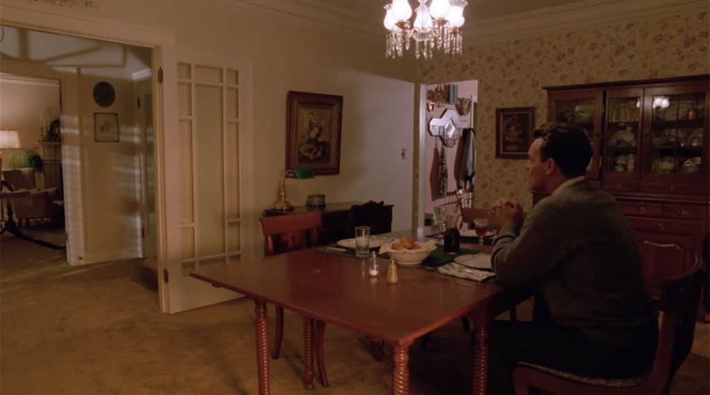 Leland Palmer at the dinner table
