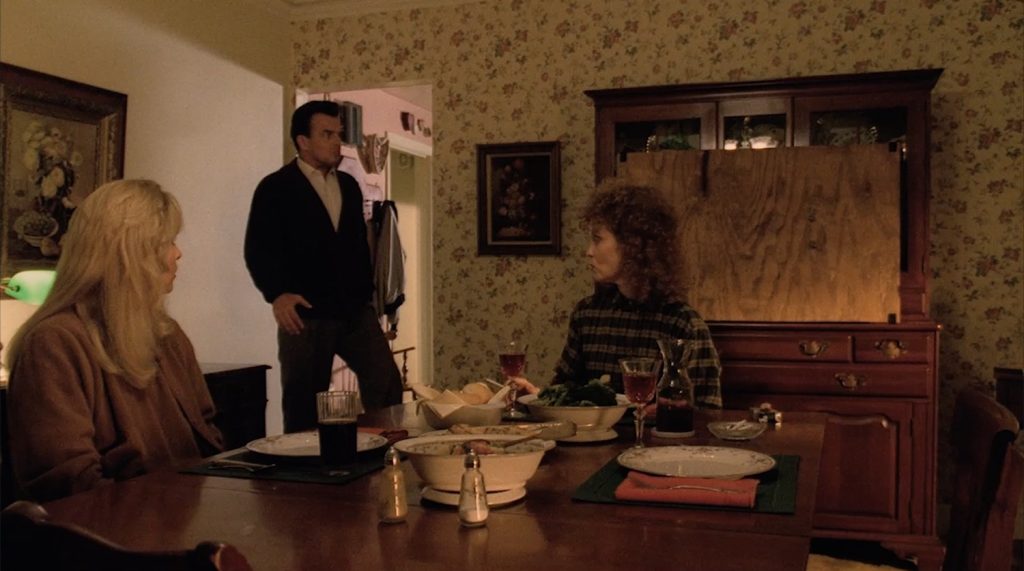 Leland Palmer entering the dining room