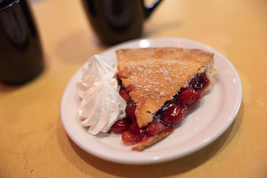 Cherry pie with whipped cream