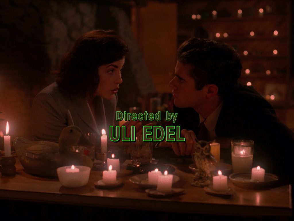 Uli Edel credit over Audrey Horne and Bobby Briggs at the Great Northern Hotel
