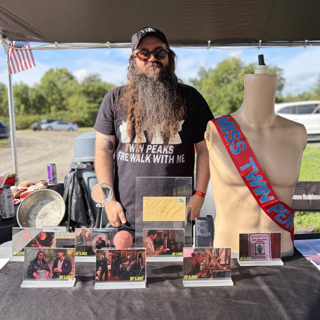 Vinnie Guidera with a display of Twin Peaks props
