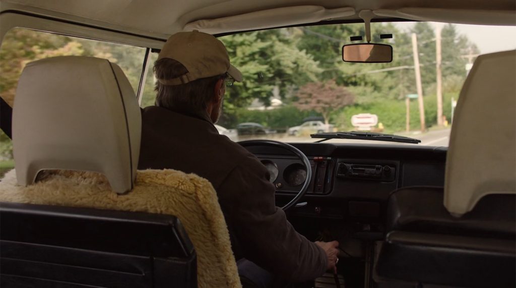 Bill turning the vehicle onto the road