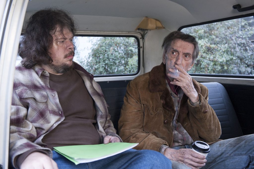 Mickey and Carl Rodd in the back of a van