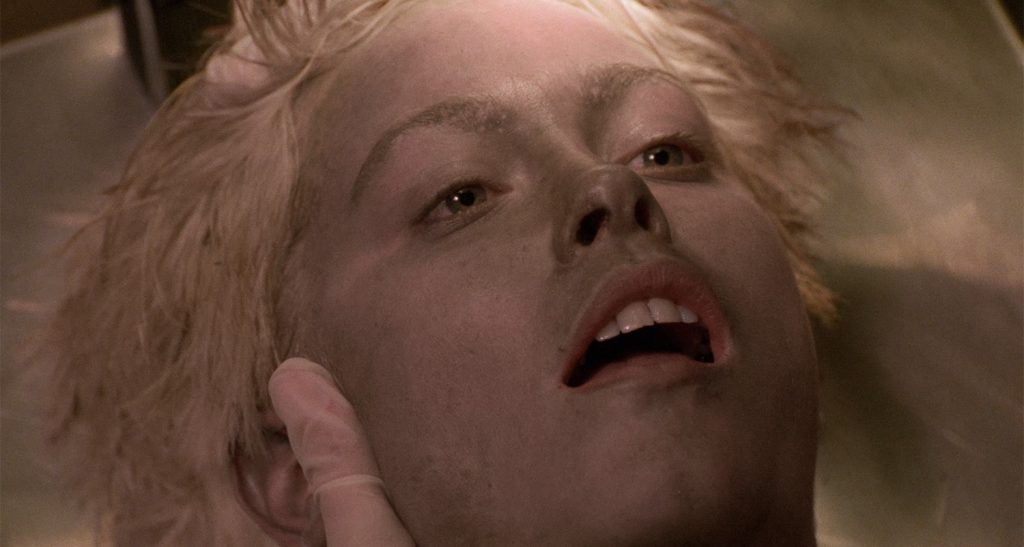 Sam Stanley examining Teresa Banks head