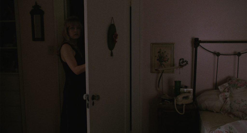 Laura Palmer standing at the doorway from Twin Peaks: Fire Walk With Me