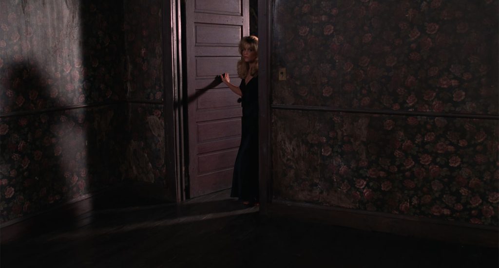 Laura Palmer standing at the doorway from Twin Peaks: Fire Walk With Me