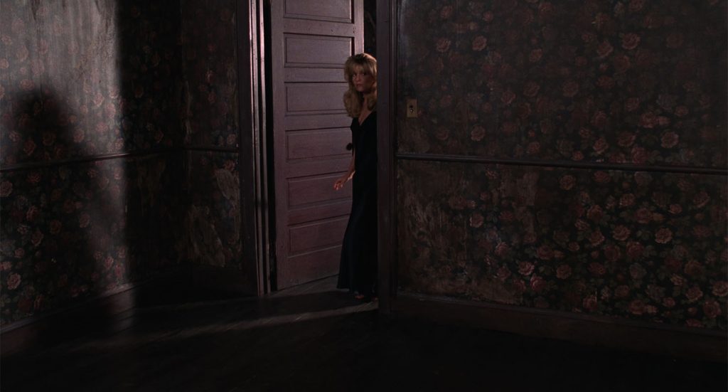 Laura Palmer standing at the doorway from Twin Peaks: Fire Walk With Me