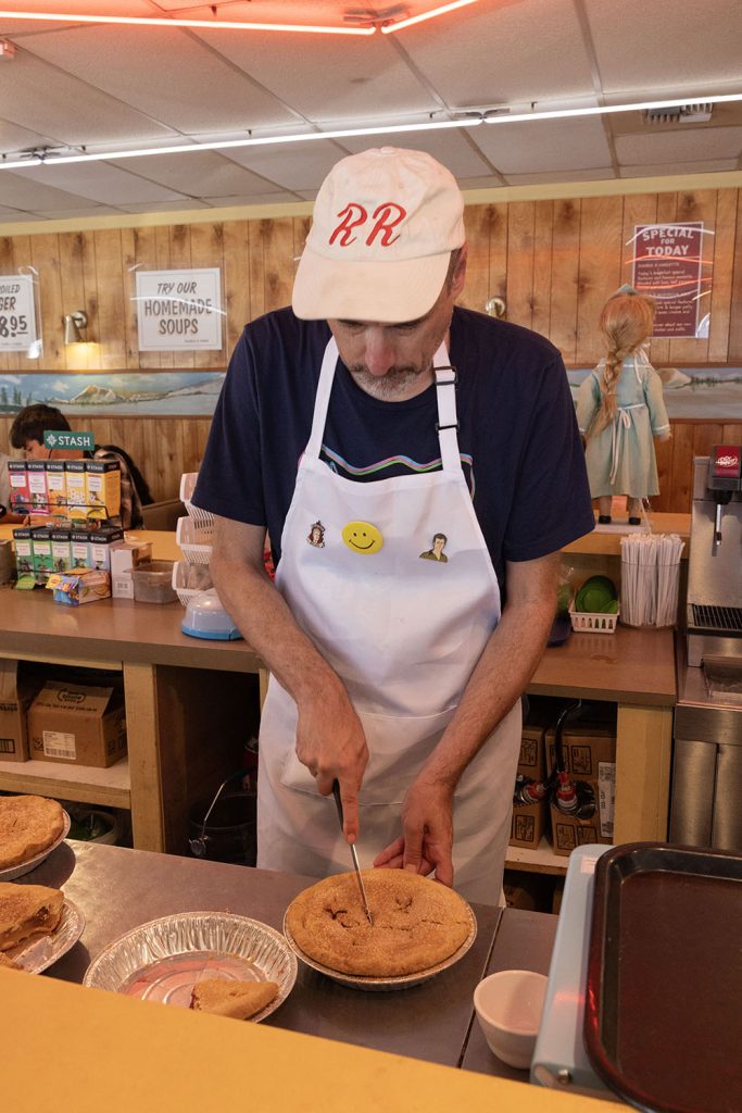 Scott Ryan serving pie