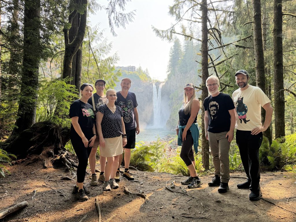 Group shot by the water fall