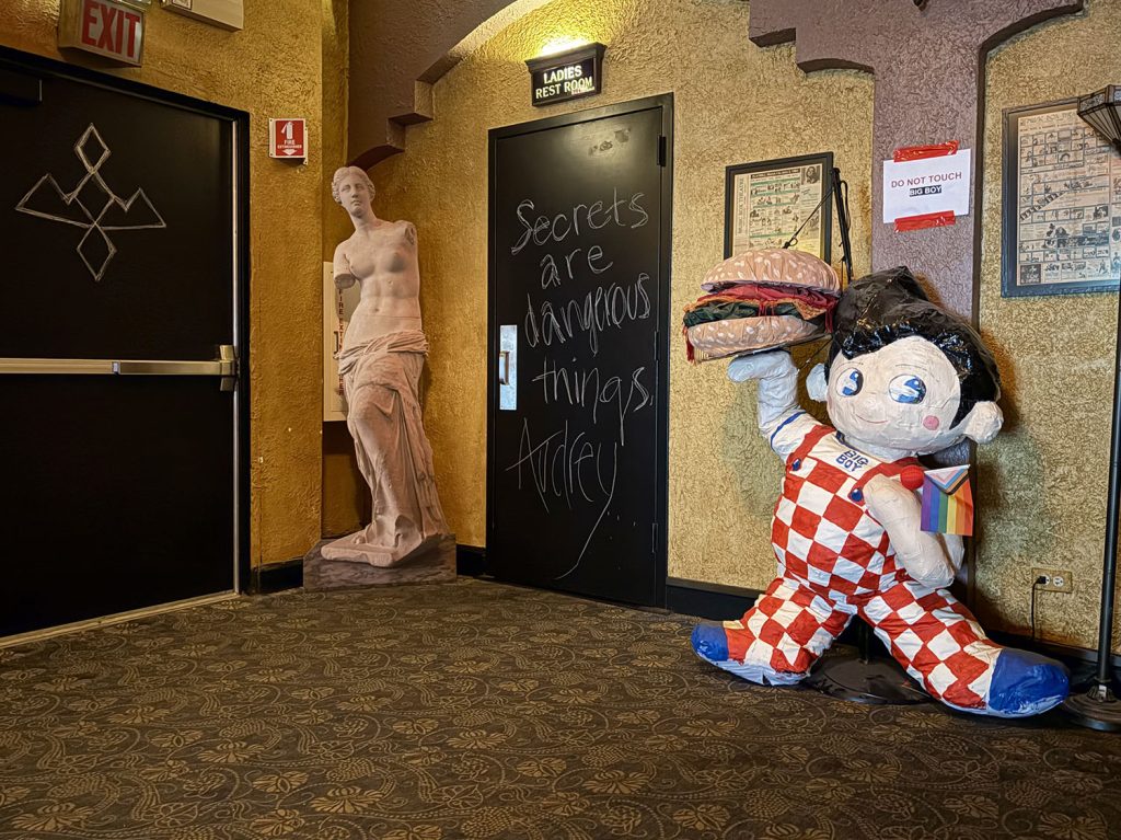 Standee of Venus De Milo and a Big Boy statue